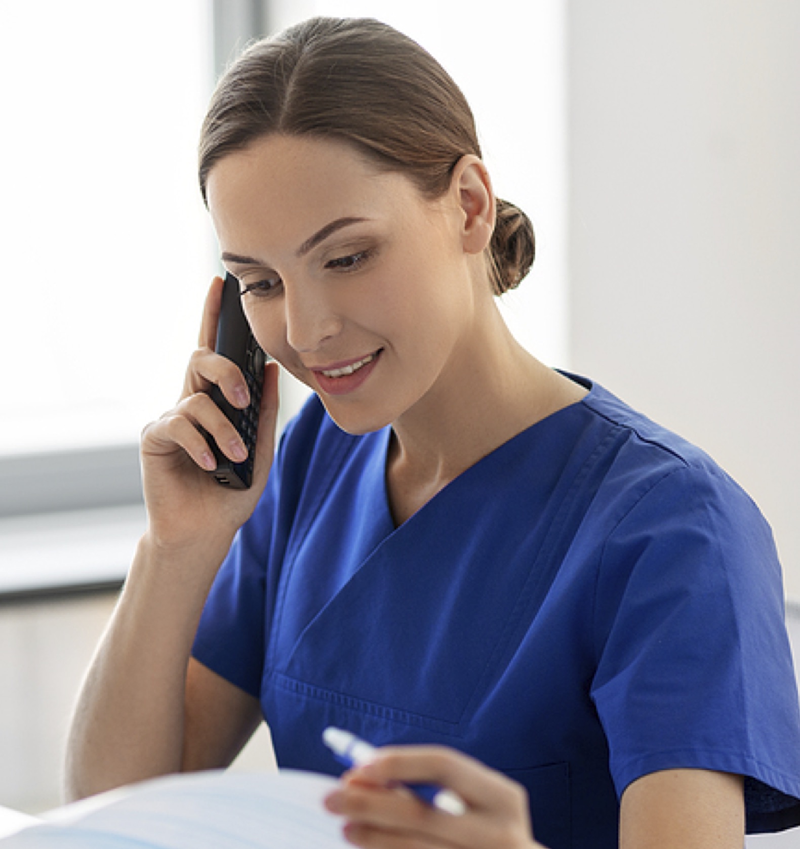 A woman helping to give pregnancy Resources & Referrals in Dubuque, Iowa